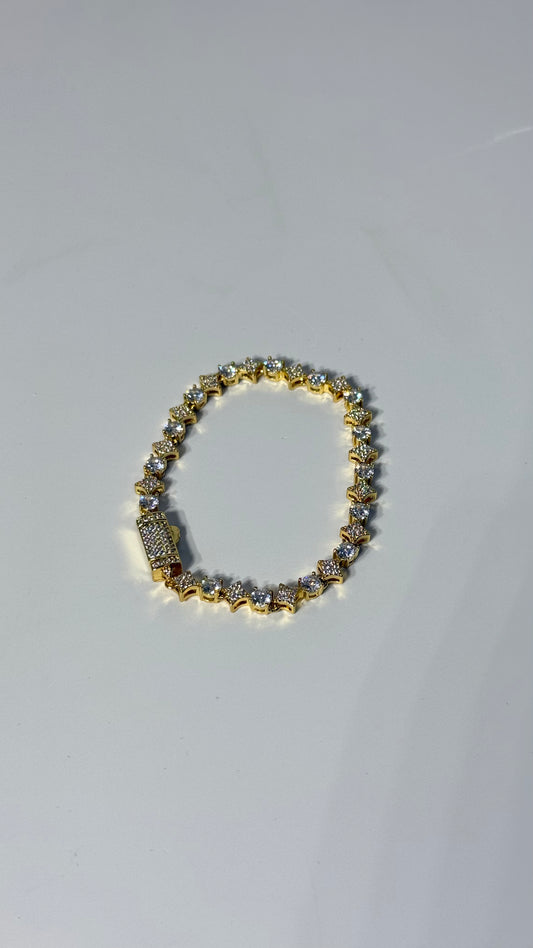 Pulsera tenis estrella en diamante.